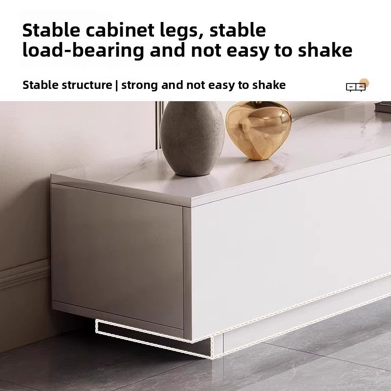 Cream media console with rounded edges and understated modern styling