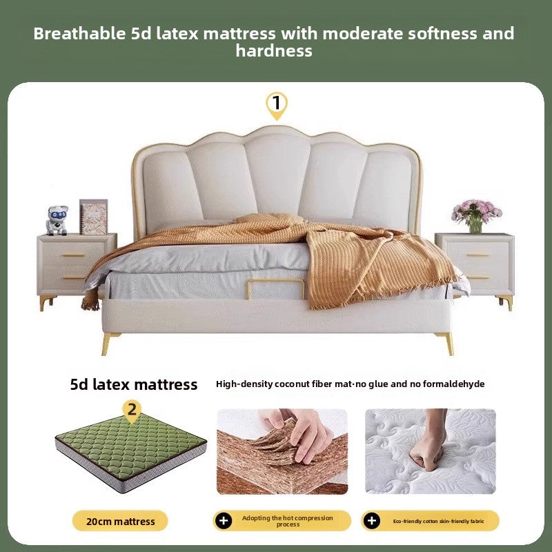 Soft cream upholstered bed with sculpted headboard and calm palette