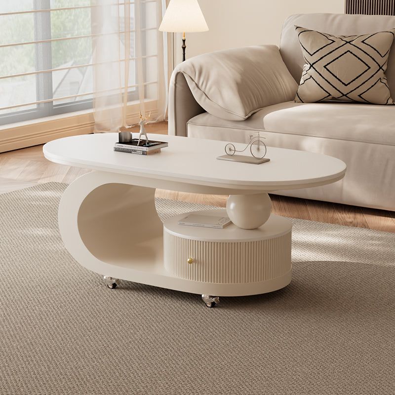 Small-space oval coffee table styled with a modern neutral seating area