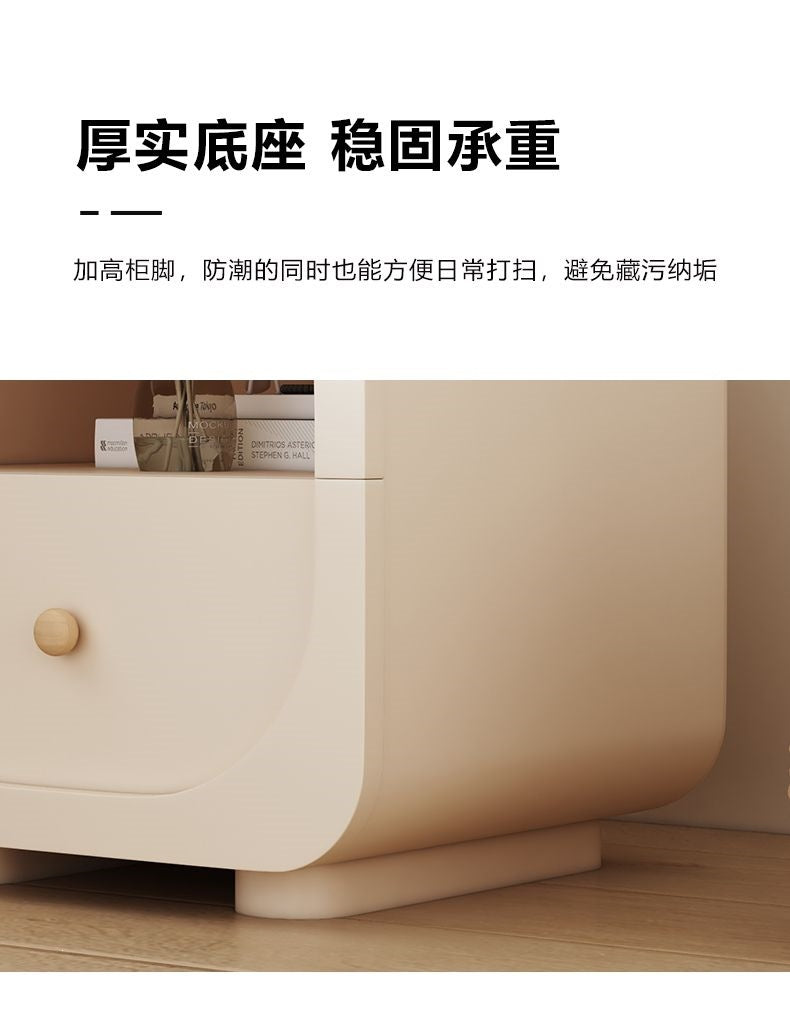 Cream nightstand with soft curves and compact bedside proportions