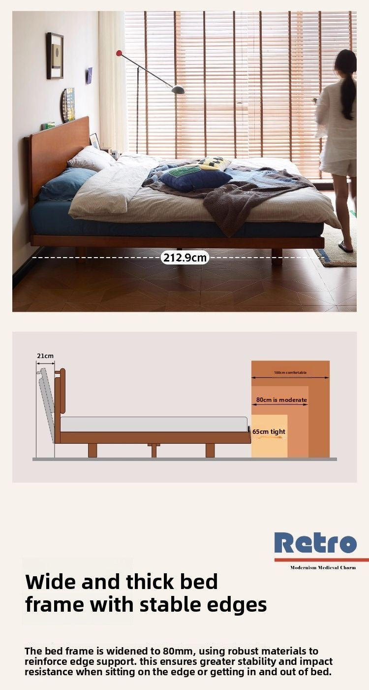 Low solid wood bed with understated modern styling and warm grain