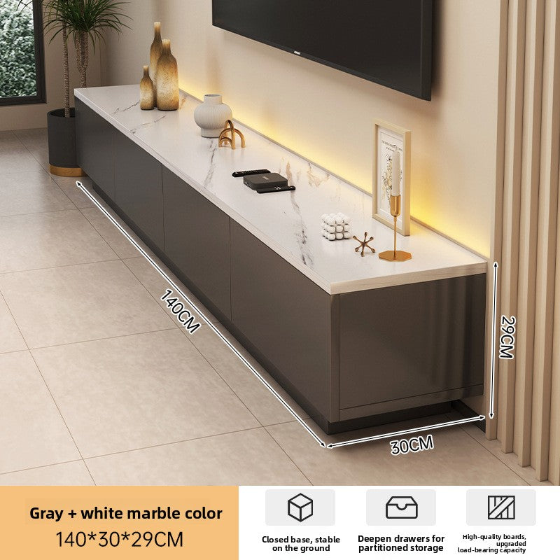 Cream low-profile TV stand shown with a compact modern living room layout