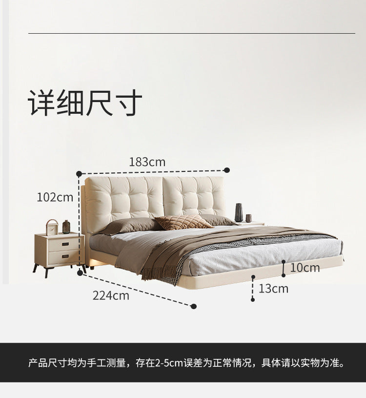 Upholstered floating bed photographed in a clean apartment bedroom