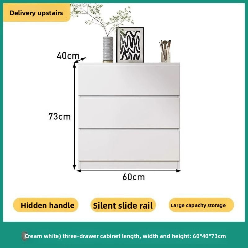 Modern cream chest of drawers styled in a bright bedroom