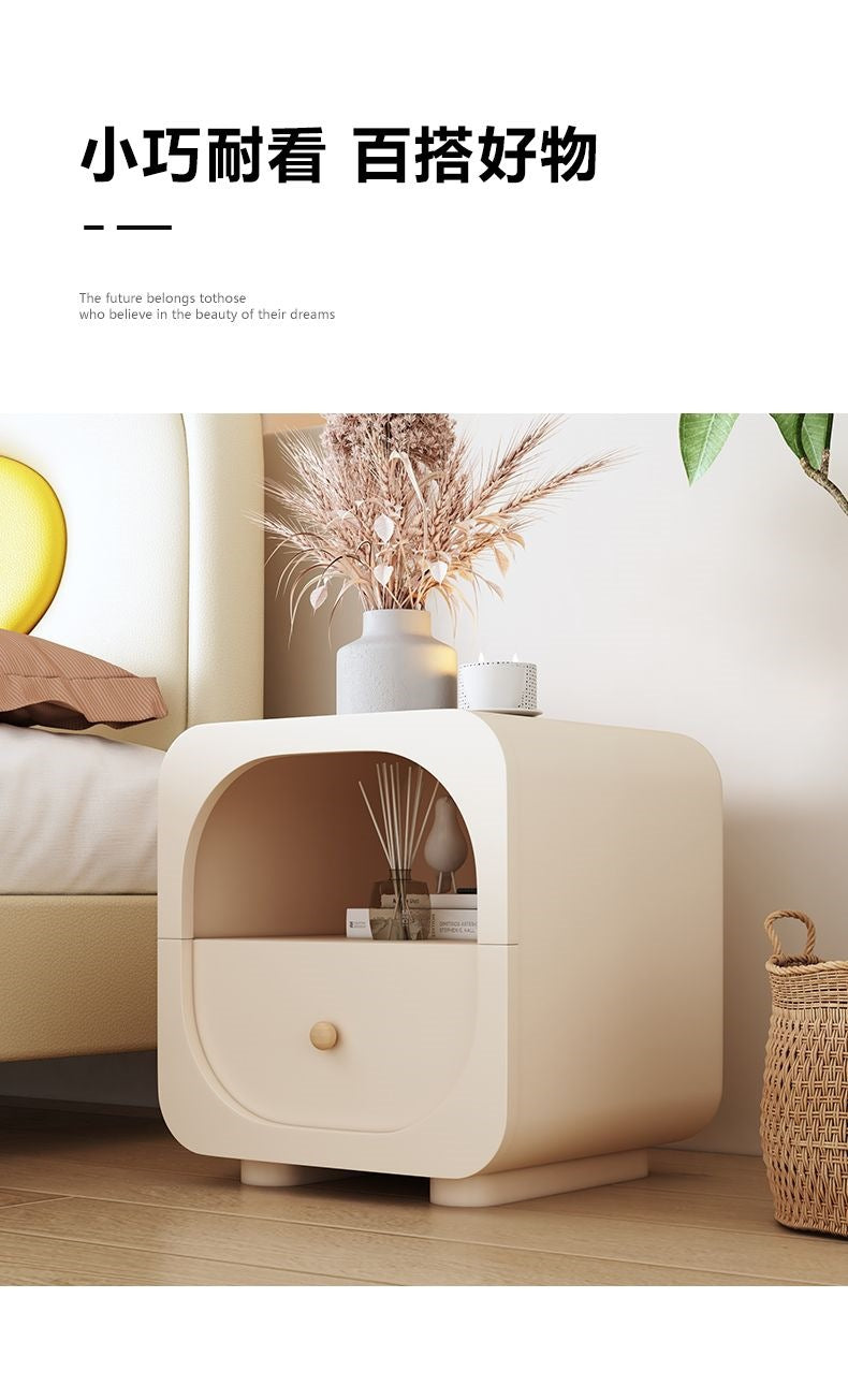 Modern cream bedside table with concealed storage for apartment bedrooms