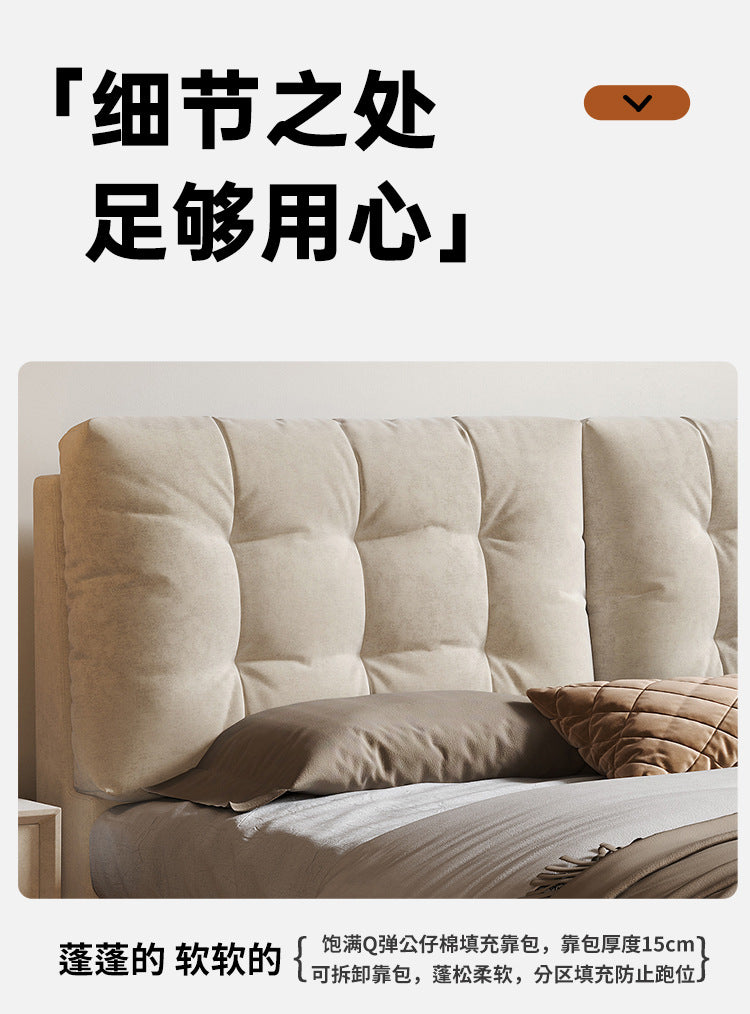Cream floating bed with upholstered frame in a soft modern bedroom scene
