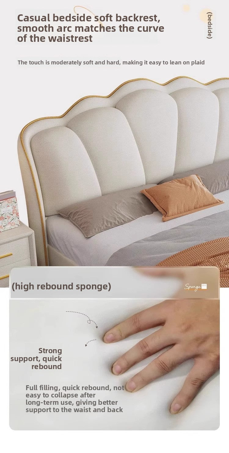 Cream statement bed with plush upholstery and balanced bedroom styling