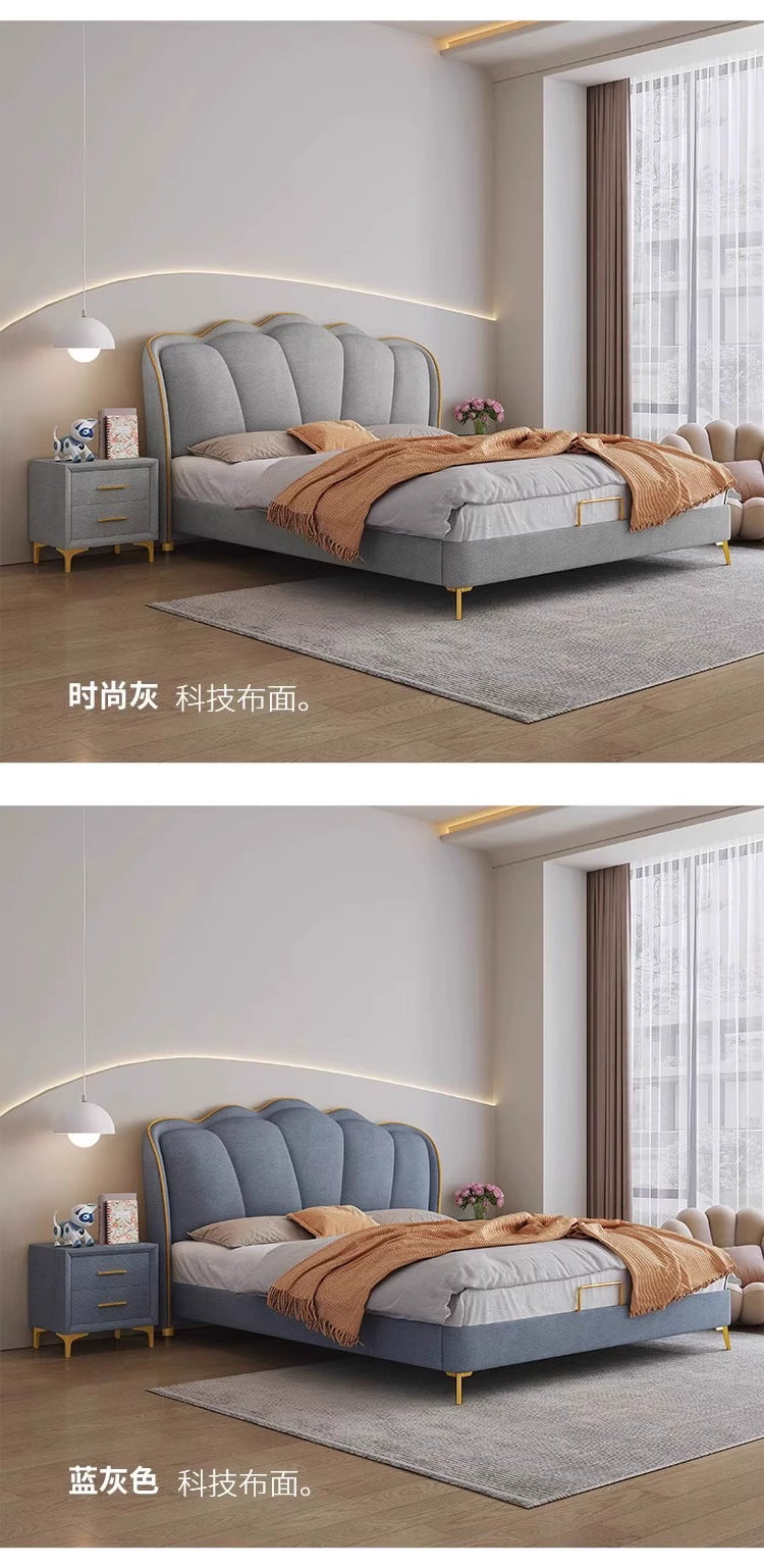 Contemporary cream bed frame with soft padded wings and tidy styling
