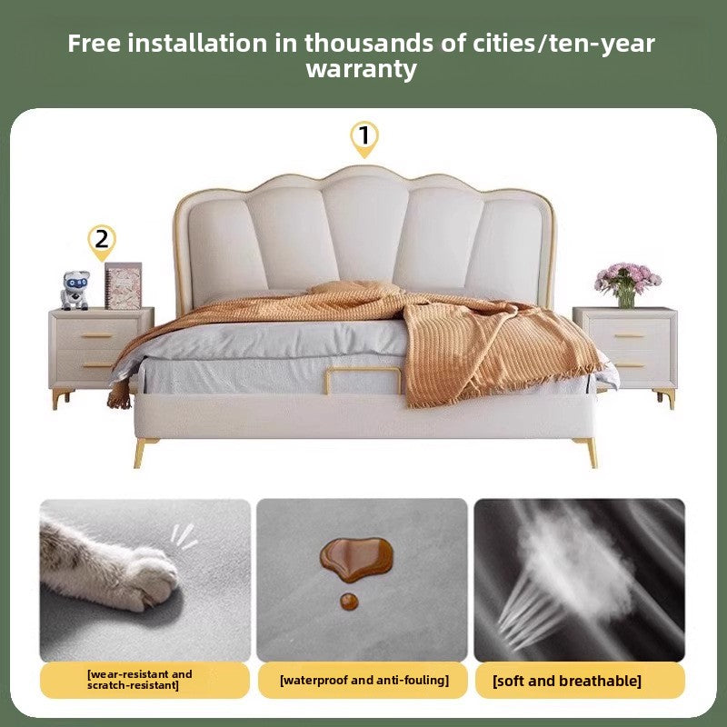 Modern upholstered bed with sculpted wings and soft layered bedding