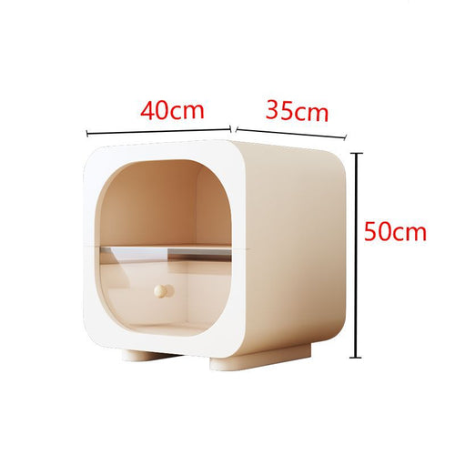 Cream nightstand with wood drawer in a compact bedside setup