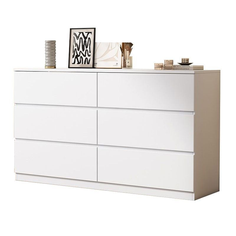 Tall cream dresser with vertical storage in a modern bedroom