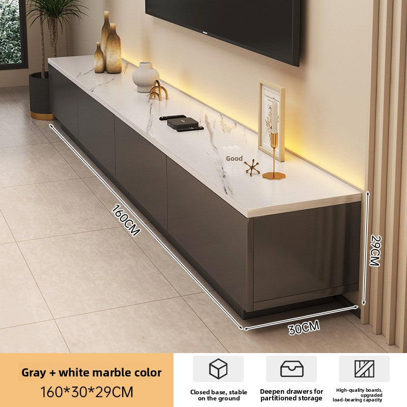 Low-profile media console with rounded corners and soft cream finish